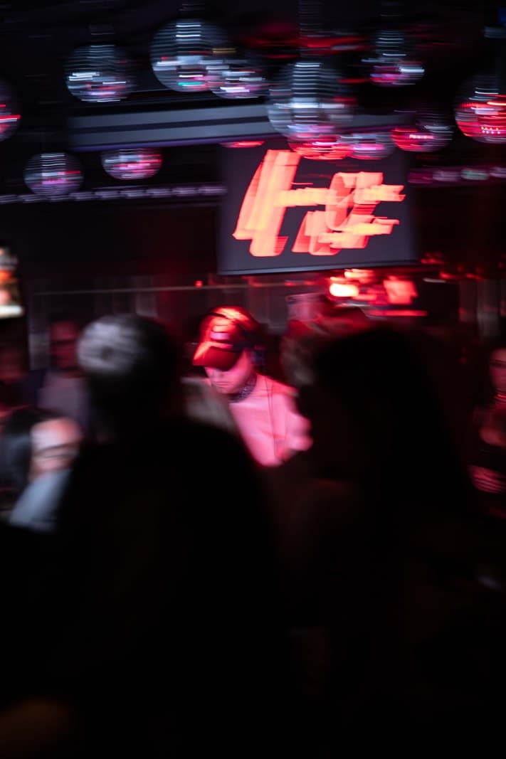 Busy London nightclub interior with ambient lighting