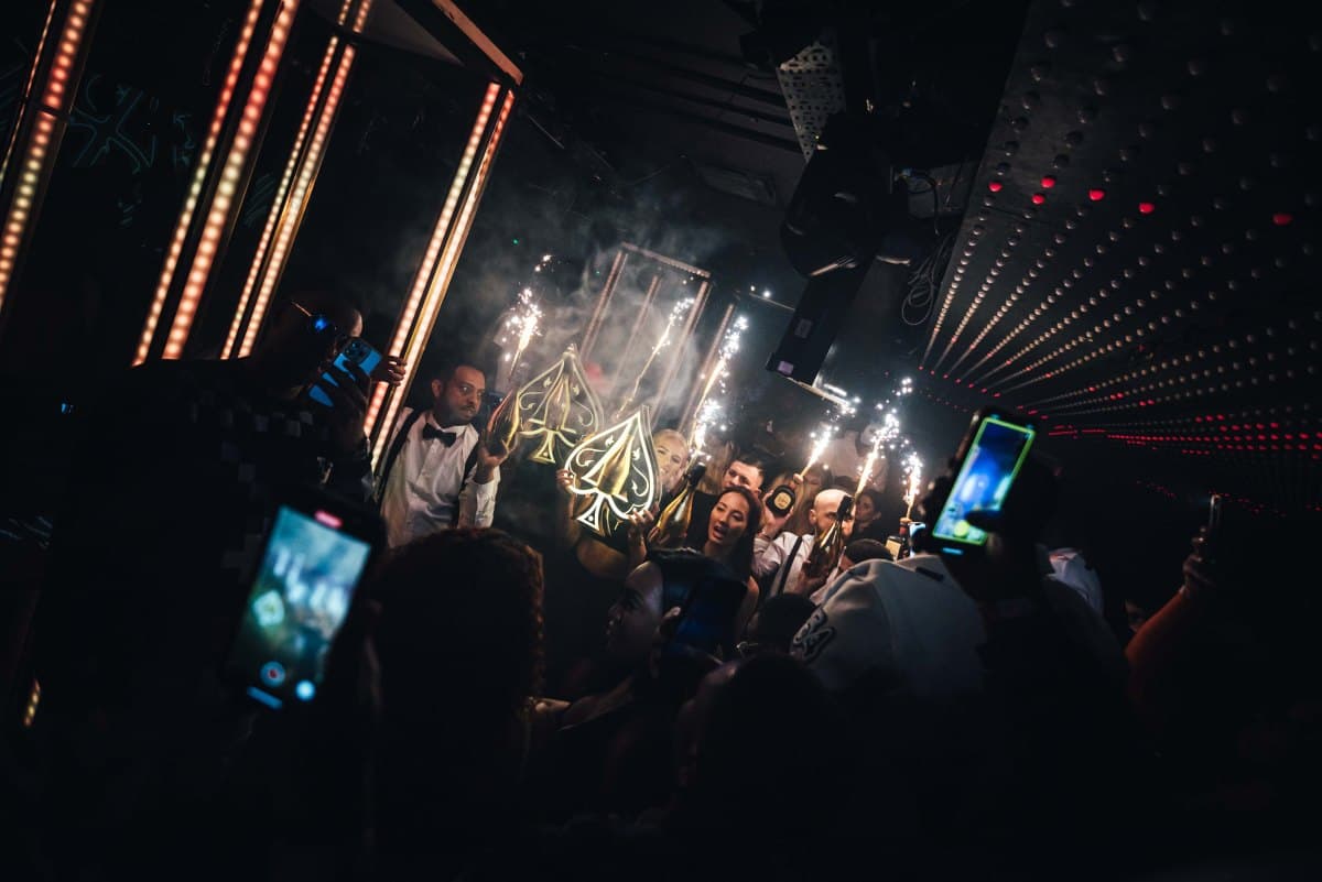 Cirque Le Soir nightclub interior with VIP tables and theatrical entertainment
