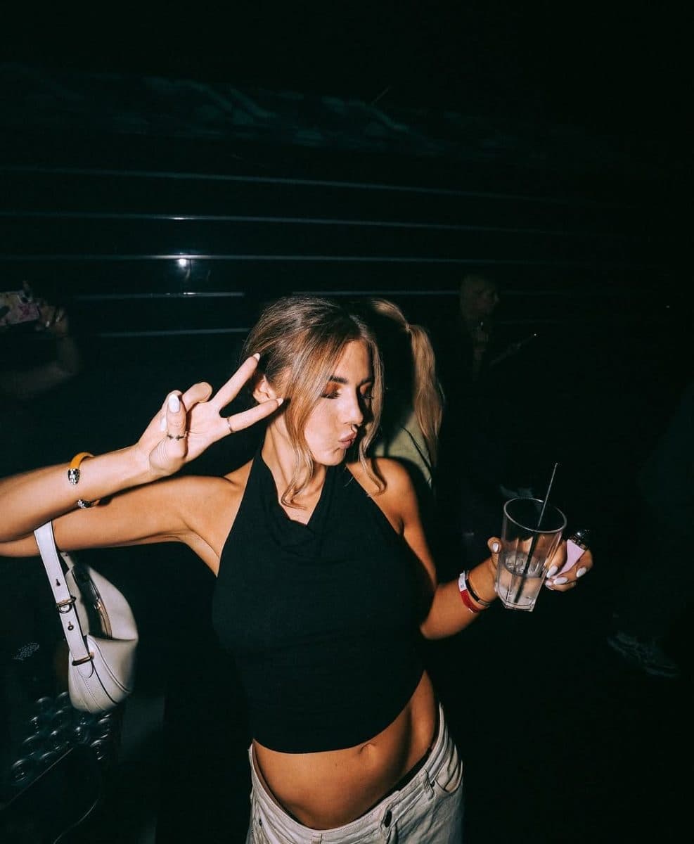 Well-dressed guests arriving at Funky Buddha nightclub in Mayfair