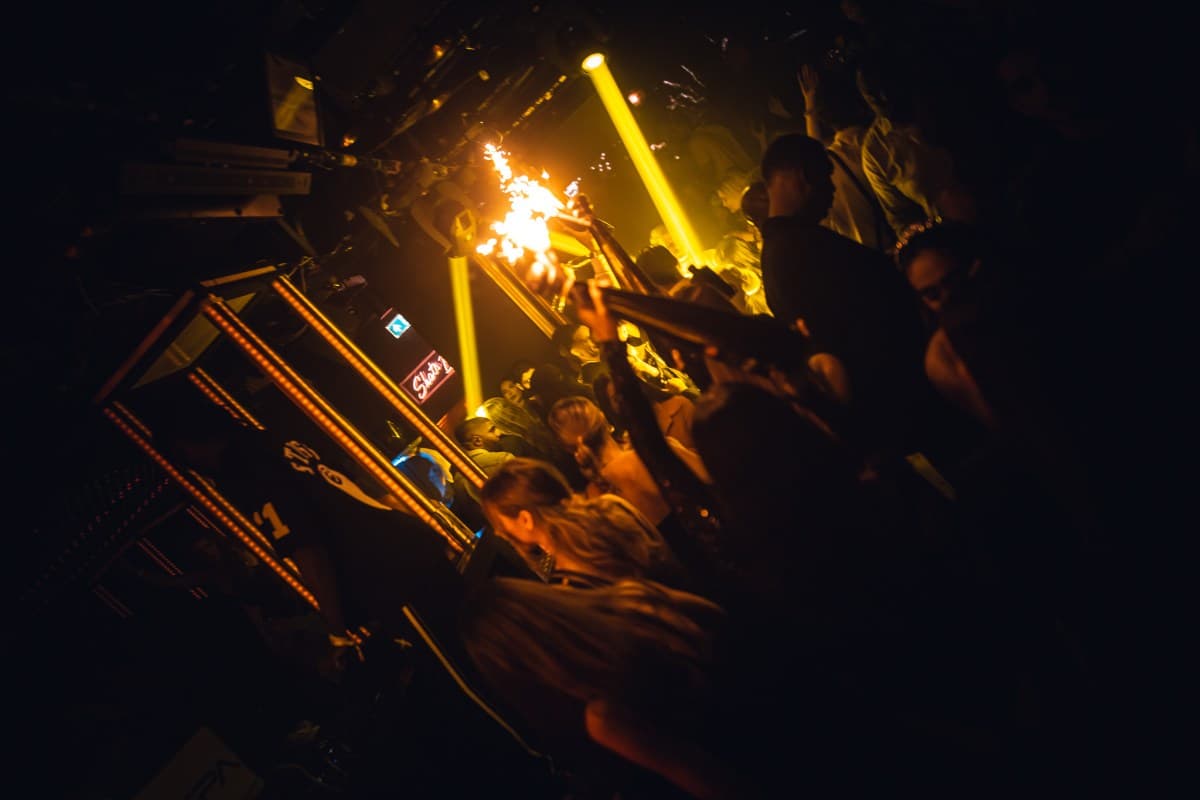 VIP table setup at Tape London nightclub with bottle service and intimate club atmosphere