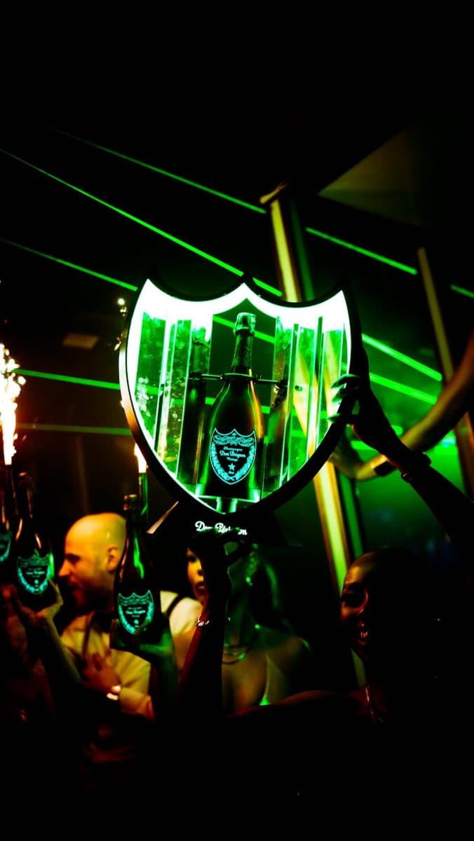 Tape London New Year's Eve celebration with confetti and VIP table service