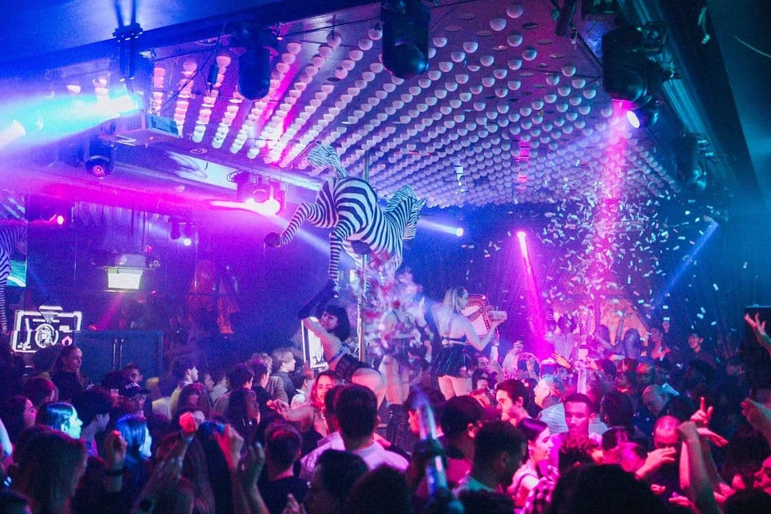 Cuckoo Club tables and busy dance floor on a party night