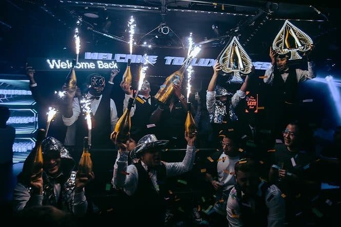 Guests with a Funky Buddha reservation dancing inside the club