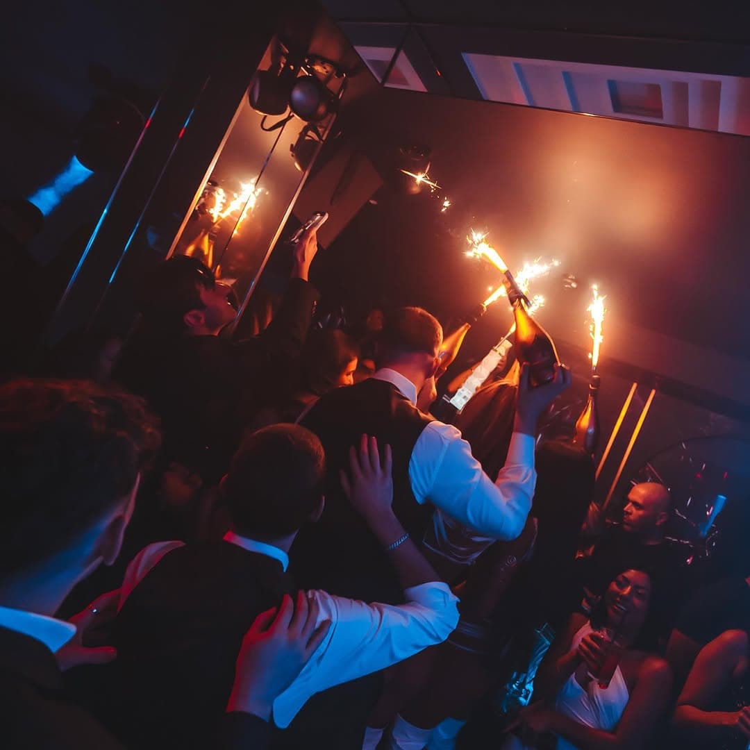 Selene Club guests partying and enjoying drinks